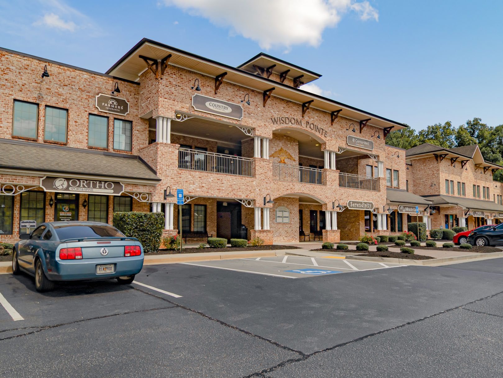 Wisdom Pointe Village, a three-story brick retail and professional center in Peachtree City, Georgia